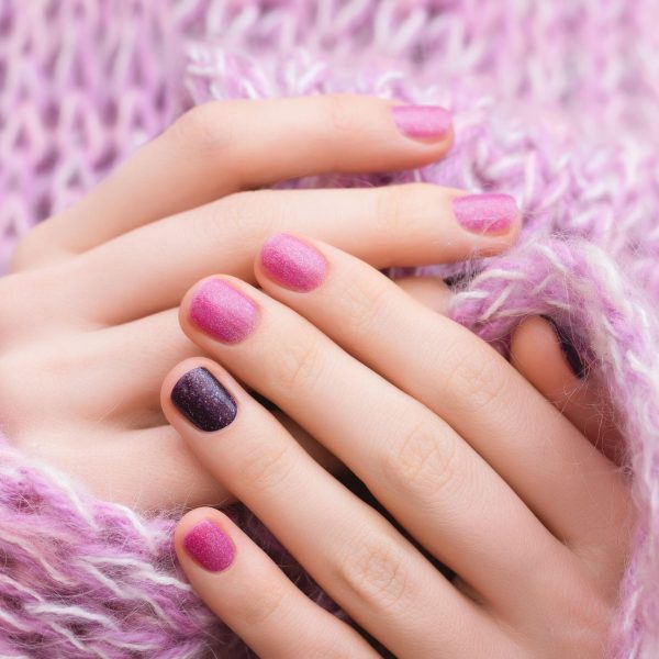 pink-nail-design-female-hand-with-glitter-manicure